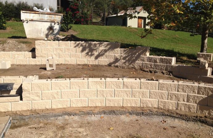 Retaining & Retention Walls-Carrollton TX Landscape Designs & Outdoor Living Areas-We offer Landscape Design, Outdoor Patios & Pergolas, Outdoor Living Spaces, Stonescapes, Residential & Commercial Landscaping, Irrigation Installation & Repairs, Drainage Systems, Landscape Lighting, Outdoor Living Spaces, Tree Service, Lawn Service, and more.